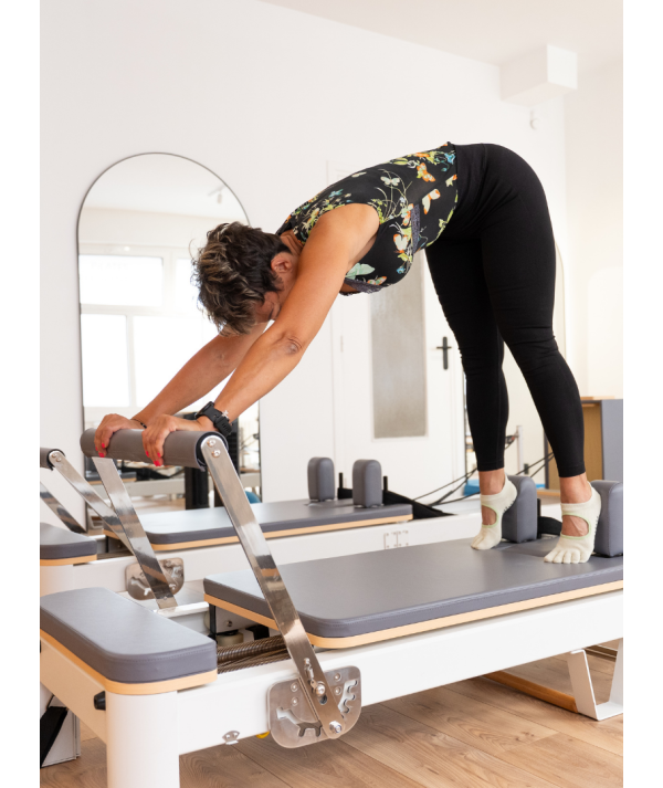 Reformer avancé coach reformer Pilates reformer
